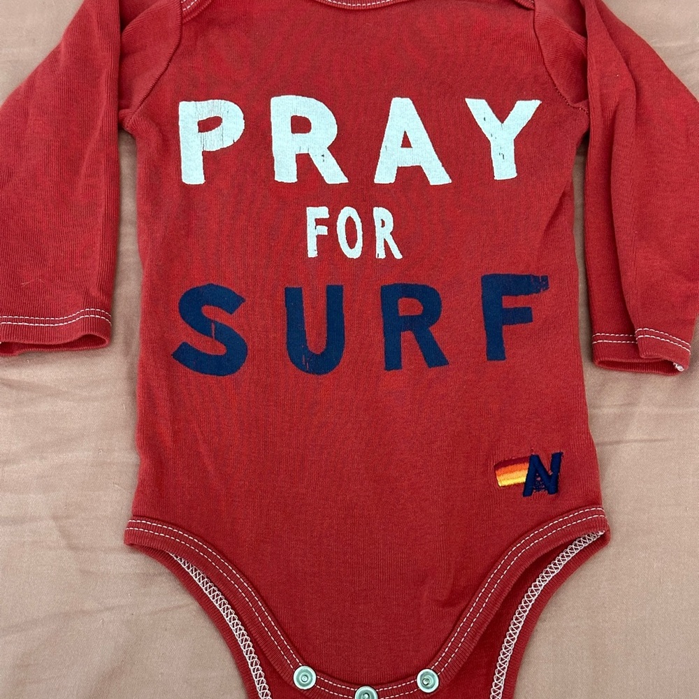 Aviator Nation pray for surf onesie